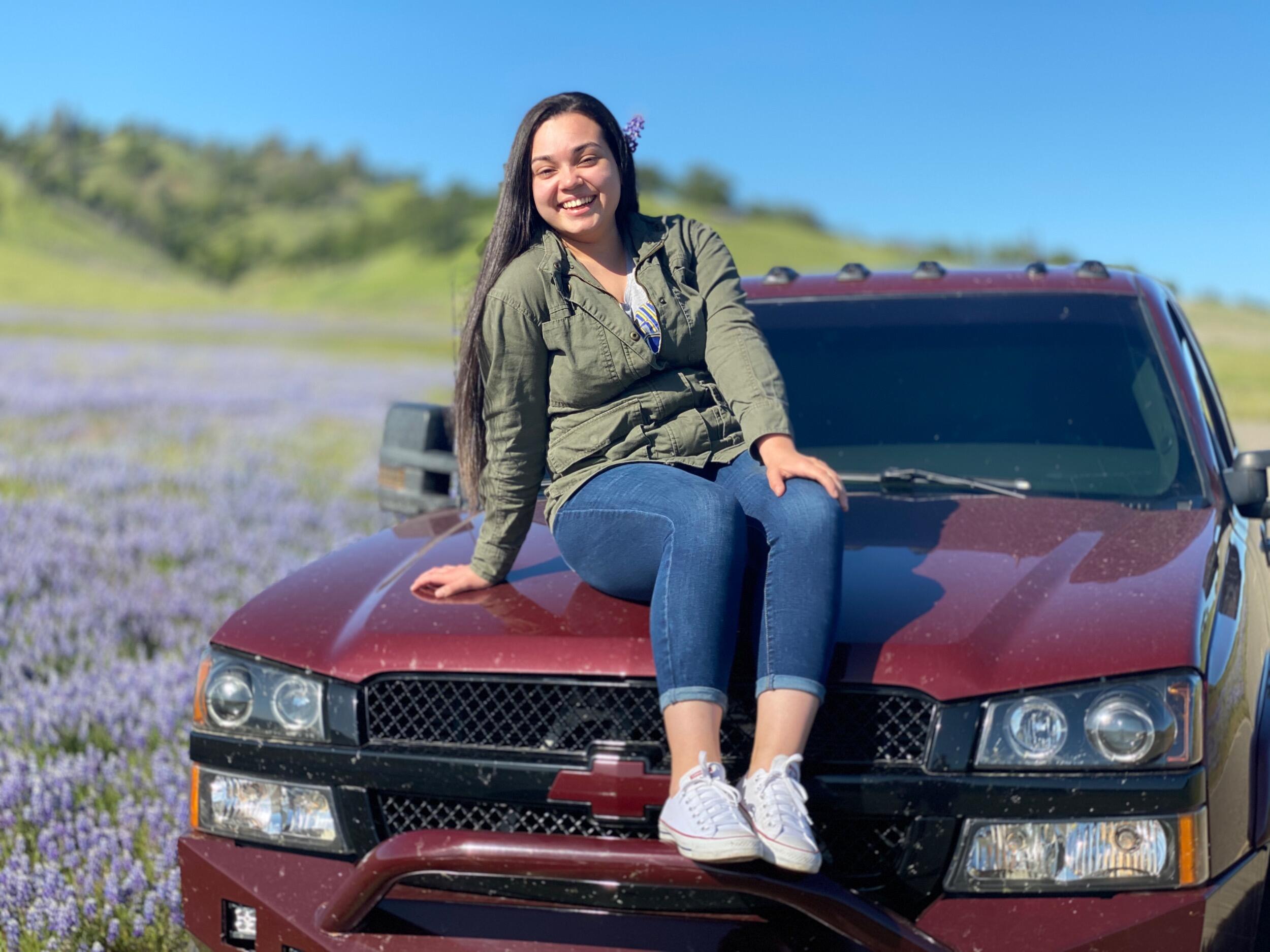 On a peaceful morning, Alberto invited Anna to join him, his parents, and their beloved family dog Buddy for a small hike. What she didn’t know was that Alberto had an entire day thoughtfully planned. After the hike, he took Anna on a long country drive in his truck...her favorite.

The road led them to the wide-open fields of Fort Hunter Liggett near King City. With the military base nearly deserted due to the pandemic, they ventured deep inside until they reached what looked like a scene straight out of a Microsoft desktop wallpaper an endless field blooming with wildflowers under the spring sun. It was stunning, still, and almost surreal.

As he placed Anna on top of his truck, Alberto looked into her eyes and softly said, “I’m ready when you are.” Completely unaware of his intentions, Anna replied, “Yeah, I’m ready to leave.” Smiling, Alberto gently asked again, “No… Will you be my girlfriend?” And in that perfect moment, surrounded by beauty and peace, Anna said yes.                                           -                                                                                                       

Una tranquila mañana, Alberto invitó a Anna a acompañarlo junto a sus padres y a su querido perrito Buddy a dar una pequeña caminata. Lo que Anna no sabía era que Alberto había planeado cuidadosamente todo el día. Después de la caminata, la llevó a dar un largo paseo por el campo en su camioneta roja 4x4 —su favorita—.
El camino los condujo hasta los amplios paisajes de Fort Hunter Liggett, cerca de King City. Con la base militar prácticamente desierta debido a la pandemia, se adentraron hasta llegar a un lugar que parecía sacado de un fondo de pantalla: un campo infinito cubierto de flores silvestres bajo el sol de primavera. El ambiente era sereno, mágico y casi irreal.
Al llegar, Alberto ayudó a Anna a subir a la parte trasera de la camioneta y, mirándola a los ojos, le dijo suavemente:
—Estoy listo cuando tú lo estés.
Sin imaginar lo que estaba por venir, Anna respondió:
—Sí, ya estoy lista para irnos.
Con una sonrisa, Alberto volvió a preguntarle:
—No… ¿quieres ser mi novia?
Y en ese instante perfecto, rodeados de paz, naturaleza y amor, Anna dijo que sí.