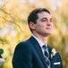 Groom in a Plaid Tie and Navy Suit