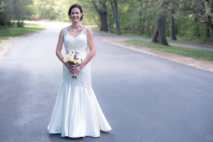 Katie’s dress took her by surprise. While she gravitated toward simple, lace gowns at the beginning of her search, a contemporary mermaid-style Jasmine Haute Couture dress eventually won her over. “When I put on the dress, I was told that my face just lit up,” Katie says. “I loved the top half of the dress and all the sparkle.” She had a seamstress customize the gown by reworking the long chapel-length train into a functional sweep style.