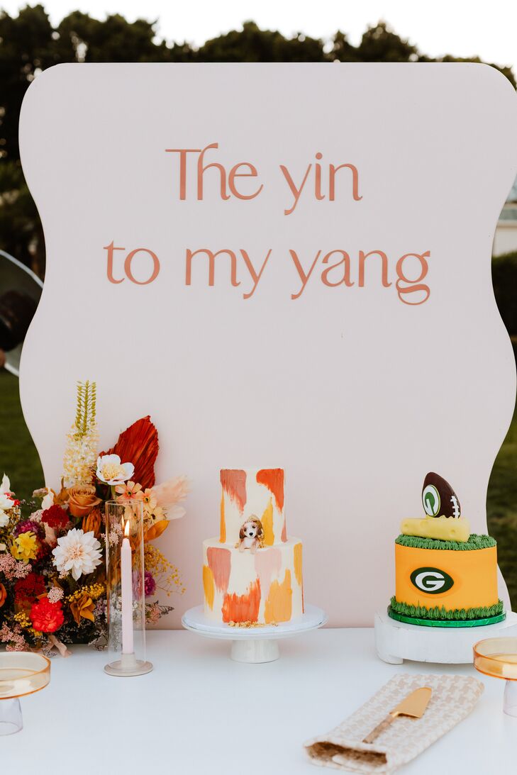 Dessert Table With Colorful Bride's Cake and Green Bay Packers Groom's Cake