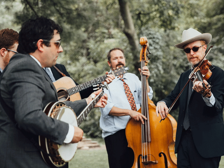 Bluegrass band performing romantic songs for wedding.
