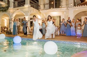 Brides Jumping into Swimming Pool During Wedding