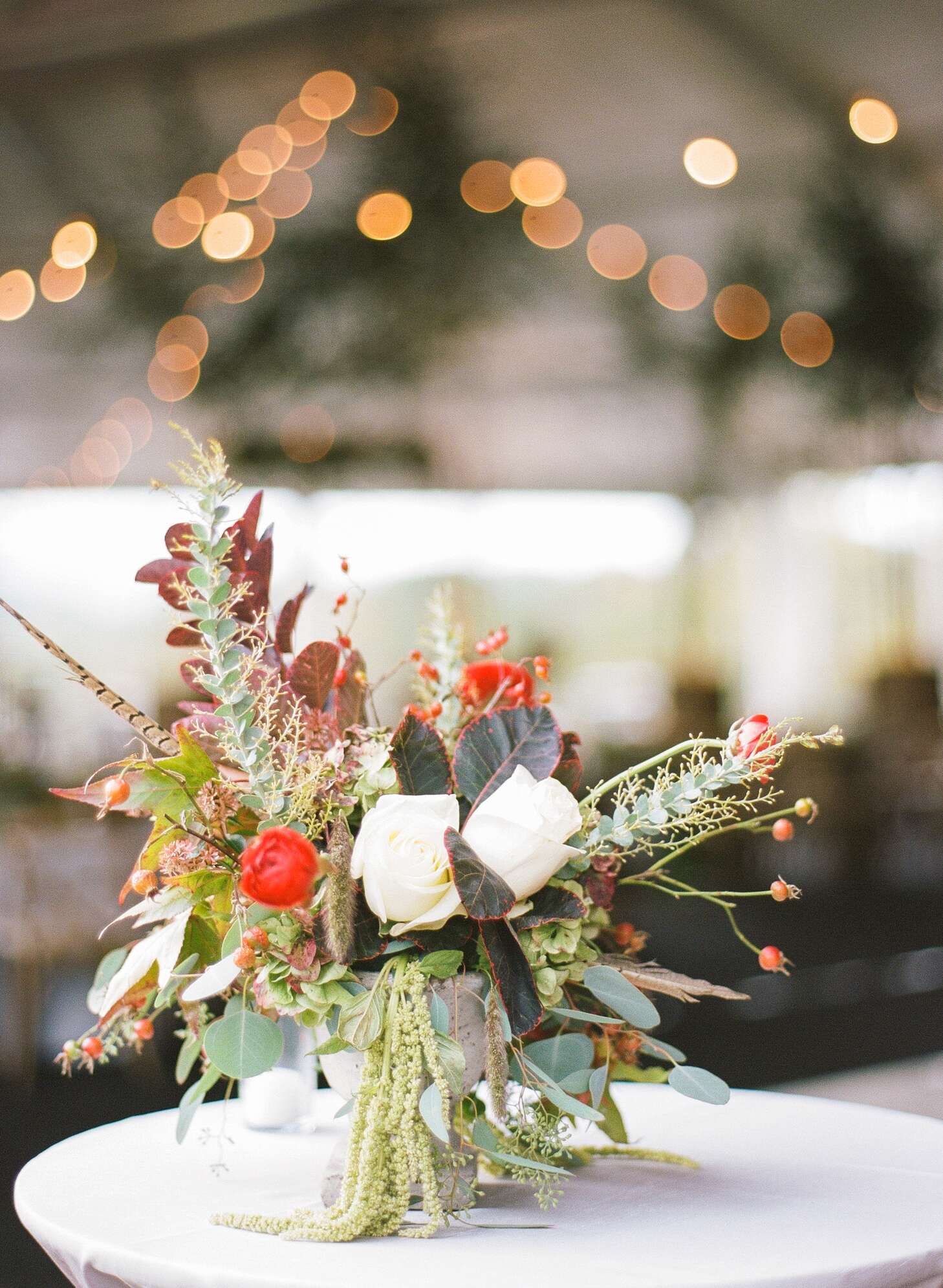 Fall-Inspired Centerpiece with Pheasant Feathers