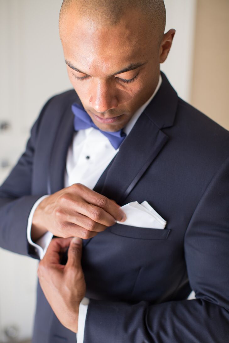 Leonard wore a Michael Kors Ultra Slim Fit tuxedo. For the ceremony, he accented the look with a traditional Hawaiian lei wrap, made with white orchid and palmy greens.