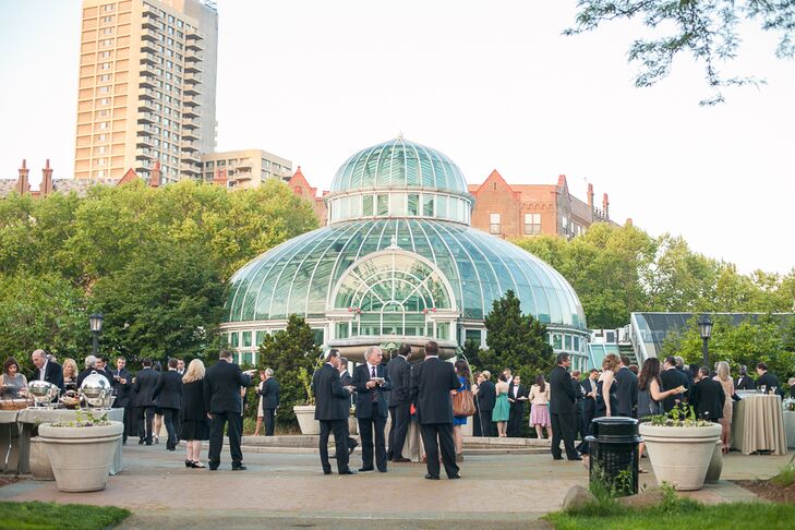 Alexandra and Will held their cocktail hour outside, in the main courtyard of the Palm House at the Brooklyn Botanic Garden, where guests enjoyed chicken and waffles, miniature grilled cheeses and oyster shooters along with their signature cocktails.