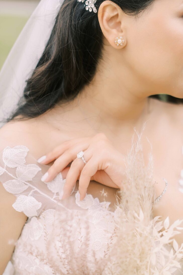 Bride Wearing Engagement Ring and Getting Ready
