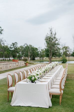 Long Table With Cream Linen and Upholstered Wood Chairs at The Club at Houston Oaks in Texas