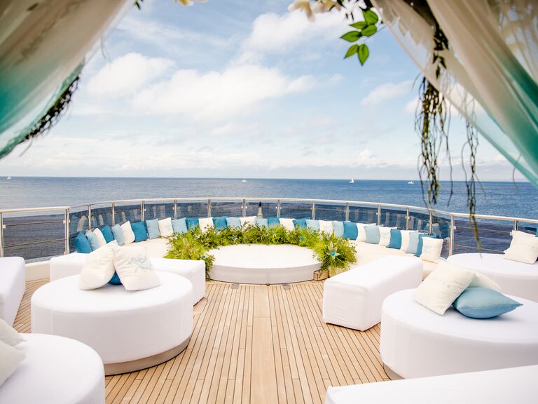 Shades of blue and white throw pillows for boat wedding