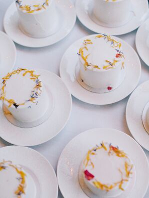 Personal White Cakes With Wildflower Petals Around the Top for Dessert