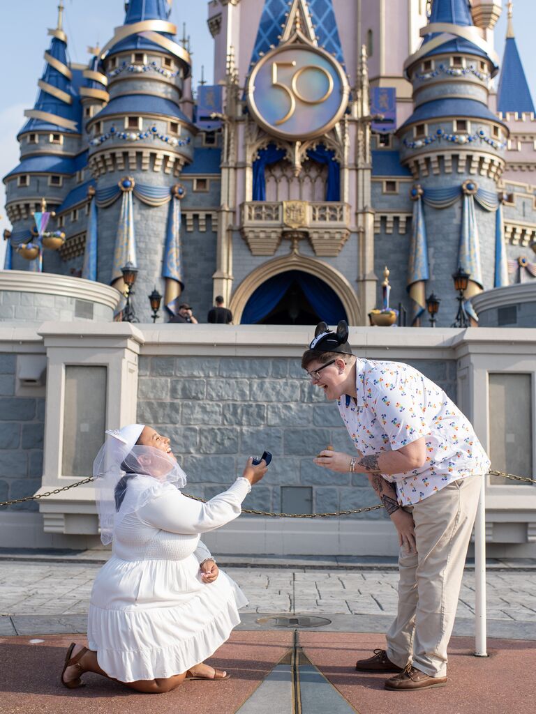 Proposal in front of Cinderella's castle in disney world