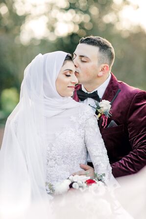 Bride and Groom Embrace During Wedding at the Durham Convention Center in North Carolina