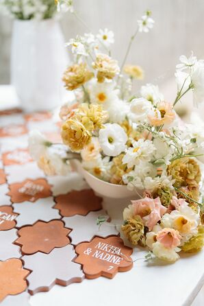 Tile Escort Cards on Table With Low Arrangements of Peach, Blush, Yellow and White