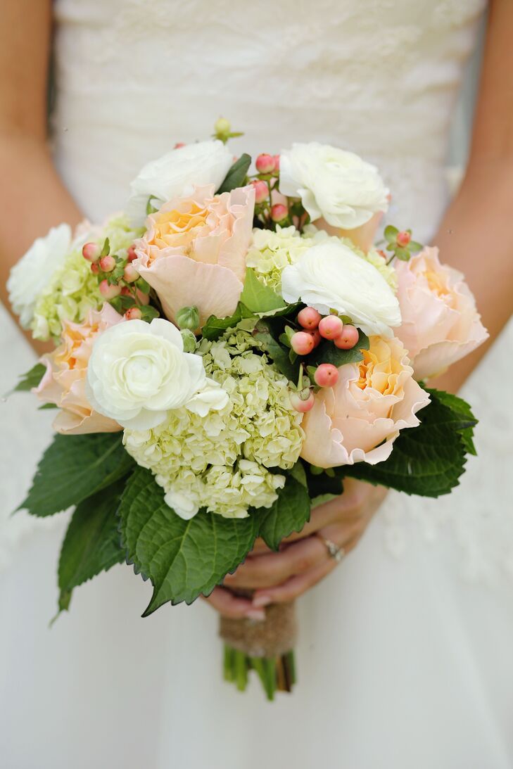 Kathleen incorporated green and white elements into her flowers and decor with soft hints of sweet country peach. Her bouquet included peach garden roses with white ranunculus, hydrangeas and hypericum berries.