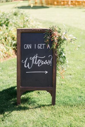 Rustic Wood Frame Chalkboard Sign with Cascading Greenery