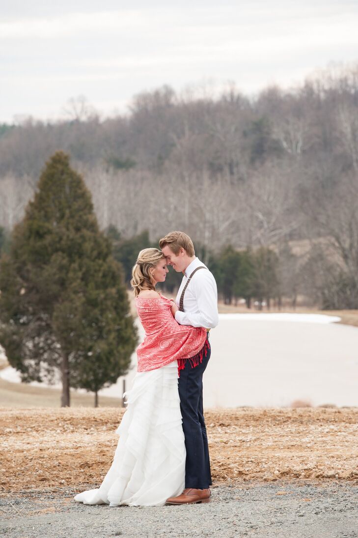 Full disclosure: This is an inspiration shoot by Rachel Foster Photography that took place at Stone Tower Winery in Virginia. Event designer Voila! Event Studio was going for a bright-yet-rustic feel and used vibrant orange tulips, red ranunculuses and blue and red plaid accents to achieve the style.