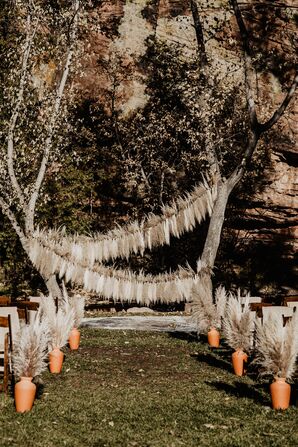 Pampas Grass Altar Decor at Wedding Ceremony at Planet Bluegrass in Lyons, Colorado