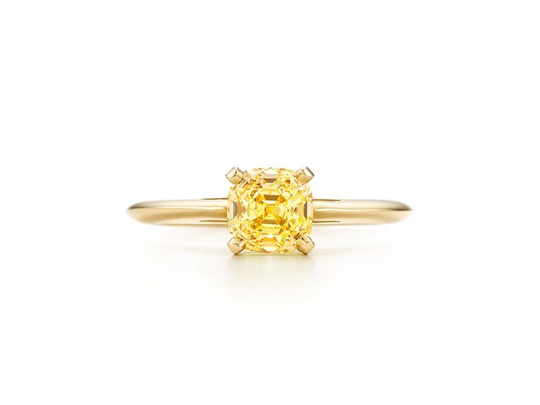 tiffany and co. round yellow diamond engagement ring with yellow gold claw prongs and plain yellow gold band