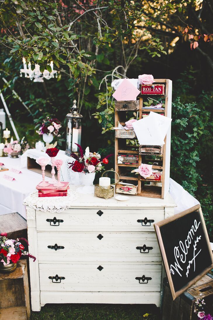 “The welcome table was one of the most beautiful pieces of wedding décor I’ve ever seen!” Julia says of the antique bureau with old wooden cubbies for cards that greeted guests at the reception.