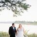 Bride in Tulle Wedding Gown and Groom in Black and Blue Tuxedo Lakeside