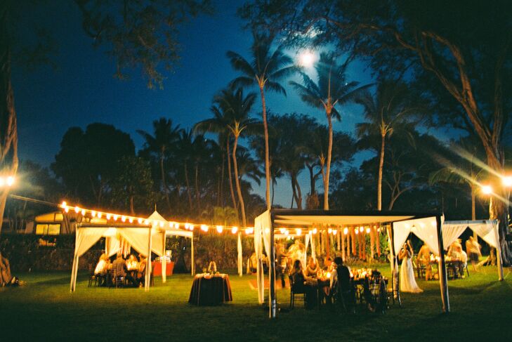 As the moon rose over the palm trees, bistro lights illuminated the dance floor and the four surrounding tables.