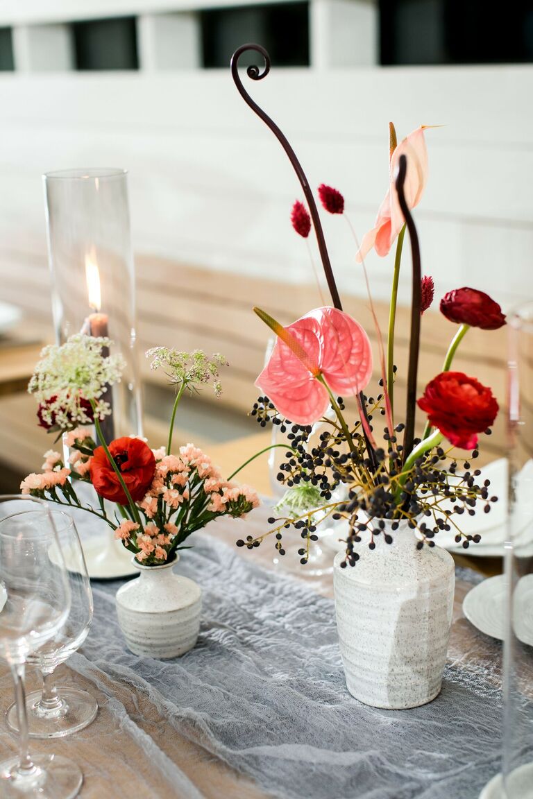Modern centerpiece with berries and anthurium