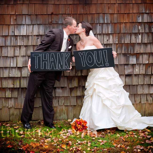Teresa wore an ivory gown with a fitted bodice and full skirt. She finished her look with a long veil that her mom made.