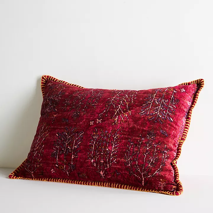Gorgeous red velvet pillow from Anthropologie for your Beauty and the Beast wedding