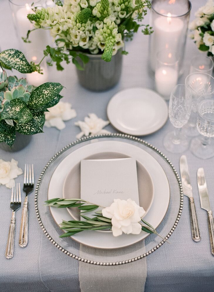 Silver-beaded chargers, china, classic flatware and bunches of succulents and gardenias greeted guests as they arrived to the feasting table.