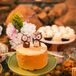 “One of the most personal pieces that stood out was our cake topper -- a homage to Ryan's grandmother and her love of owls. The owls were actually vintage salt and pepper shakers restored and redesigned by my best friend, who designed our super shabby-chic dessert table as well,” Chi says.