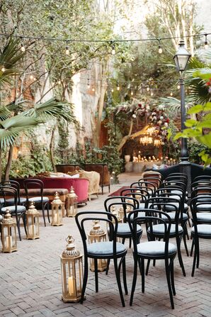 Courtyard Wedding, Gold Lantern Lined Aisle, Black Chairs, Greenery With Vintage Vibes