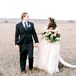 Bride and Groom Holding Hands on Their Wedding Day