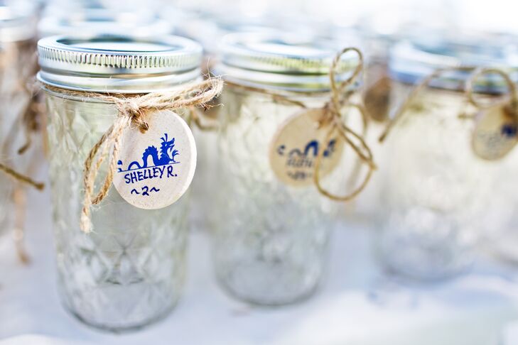 Guests received personalized jars and proceed to kegs filled with beer brewed by the bride’s stepfather (the father of the groom.