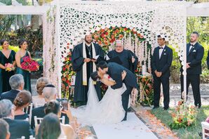 Couple Sharing First Kiss During Jewish Wedding Ceremony at The Vinoy Renaissance in St. Petersburg, Florida