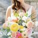 Bouquet With Yellow Ranunculus and Peach Roses
