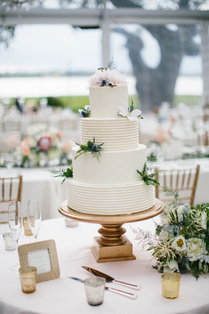 Patrick Properties Hospitality Group created Nina and Tristan's four-tier textured buttercream confection. It was lemon cake with lemon curd and lemon buttercream, hummingbird with spiced buttercream, and red velvet with cream cheese frosting. "We liked the idea of having a variety of flavors for the guests to try, and we chose the hummingbird cake because it’s a South Carolina tradition," Nina says.