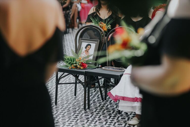 Framed picture of loved one at wedding ceremony