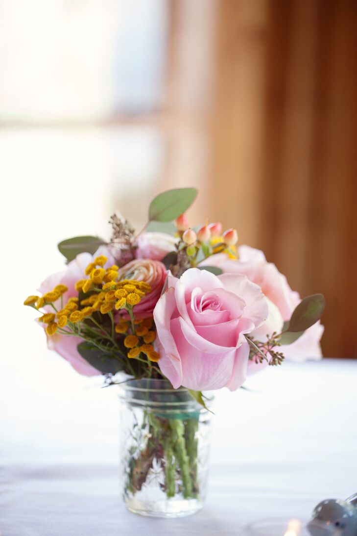 "We did all of the flowers together the day before, which was so fun," Brynn says. "We used garden roses, hydrangeas, dahlias, lilies and ranunculus in different shades of pink, peach and white."