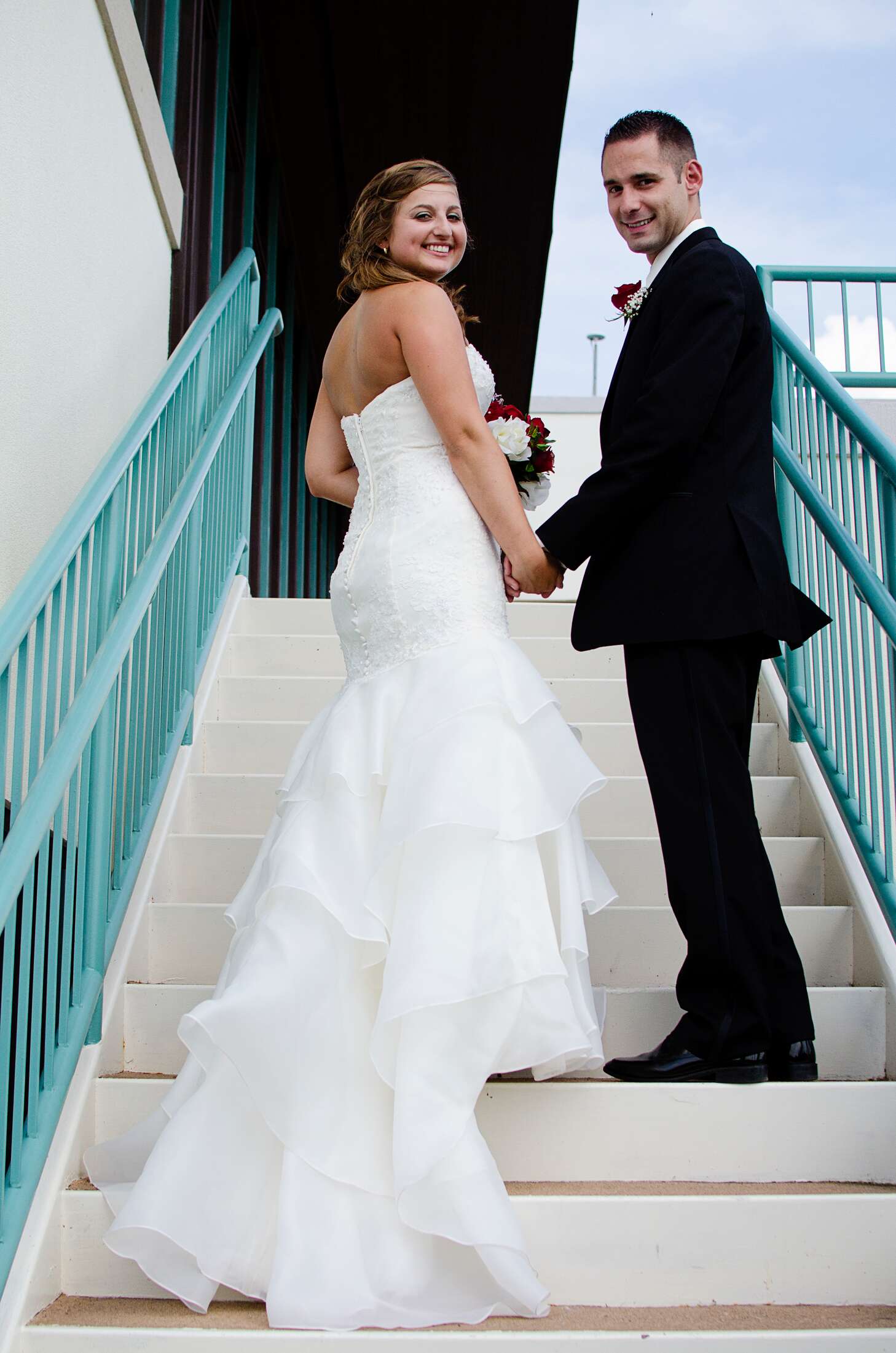 Bride in Trumpet Style Wedding Dress with a Ruffled Train
