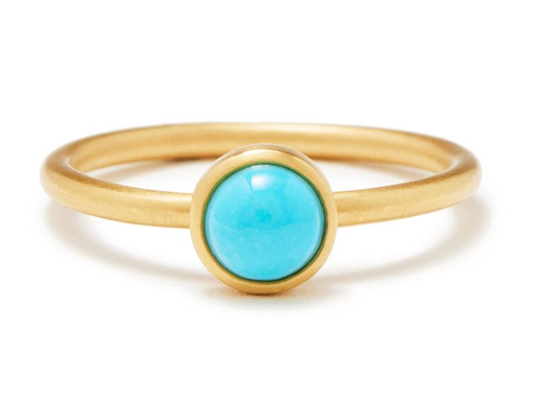 Circle turquoise stone in center on gold band