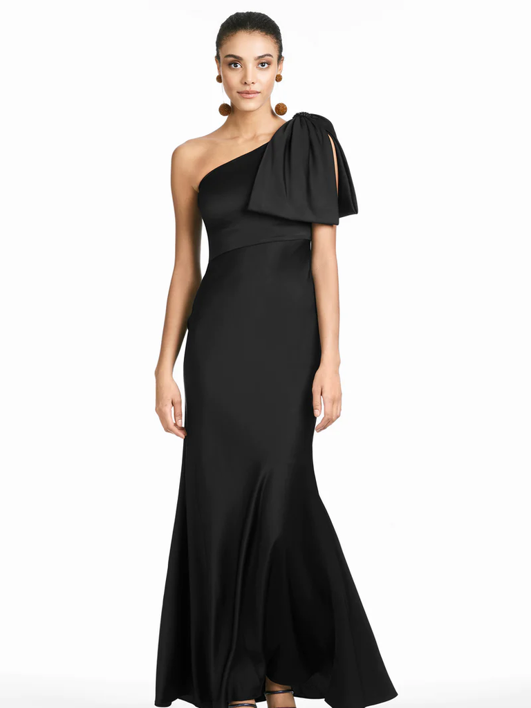 A model wears this black one-shoulder formal evening gown.