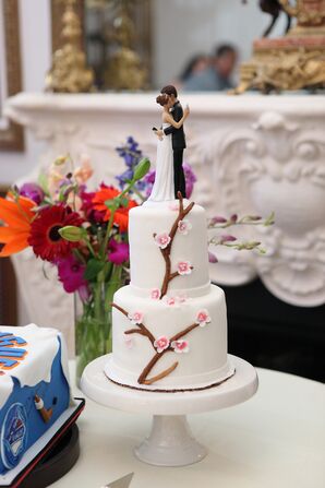 Two-Tier Wedding Cake with Cherry Blossoms and Cake Topper