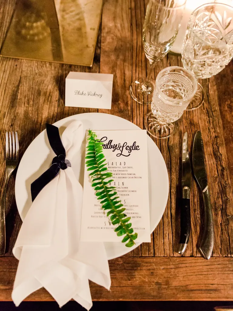Wood Table, White Place Setting and Fern Leaf