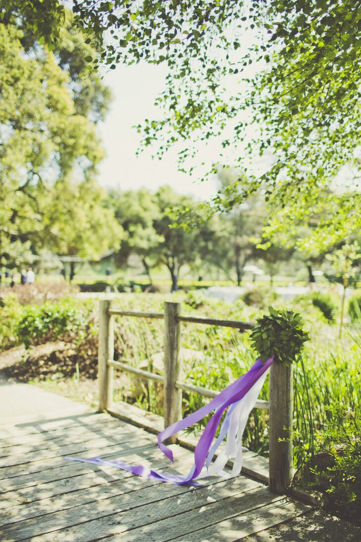 Cascading ribbons were a subtle design motif in the wedding, as they were included in the ceremony decor and several flower arrangements.