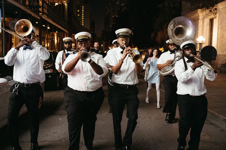 Band Members Marching Down the Street, Second Line Band in New Orleans
