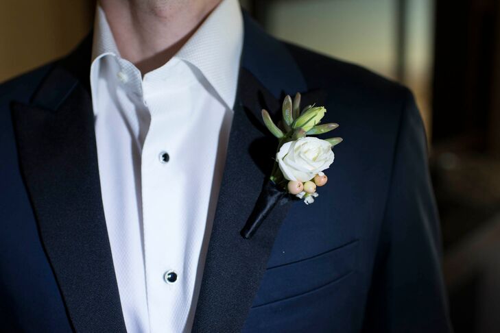 Greg and Fletcher's boutonnieres were slightly different, but included ivory and peach flowers with added succulents, which coordinated with the flowers at the outdoor ceremony.