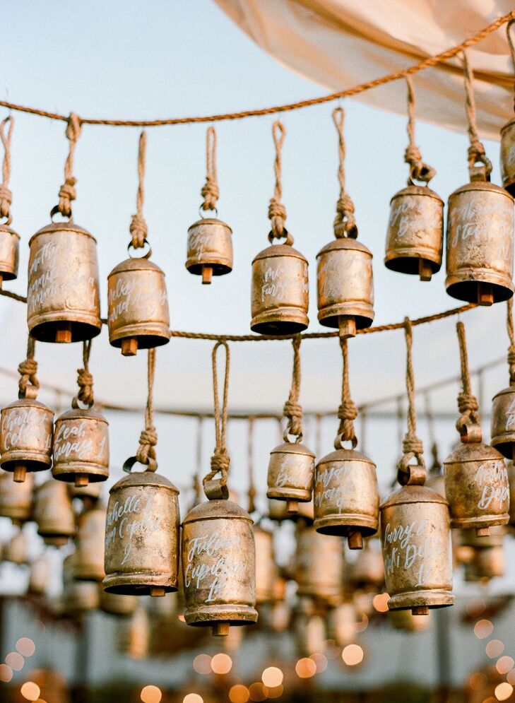 Calligraphed Brass Bells as Escort Card Alternatives