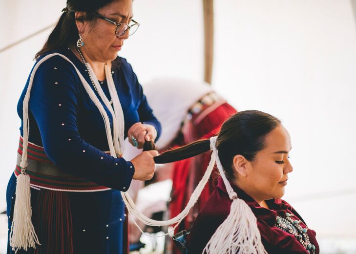 Bride Getting Hair Done for Traditional Native American Navajo Wedding Ceremony