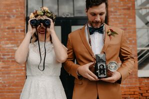 Bride With Binoculars, a Flower Crown and Lace Dress and Groom With Vintage Camera and Burnt Orange Suit