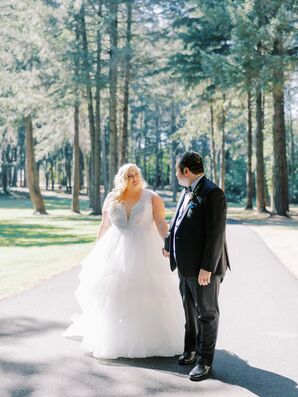 Bride in Tulle Gown With V-Neckline and Groom in Tuxedo in Forest