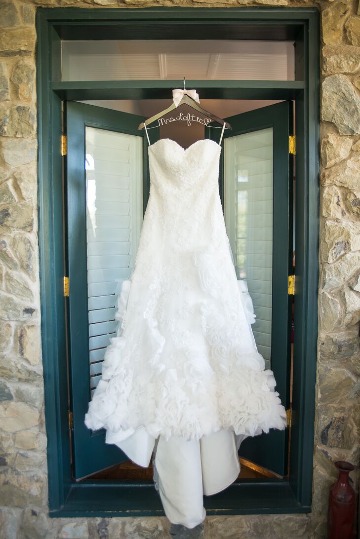 Lauren found her strapless A-line gown with tulle rosettes at a consignment shop.